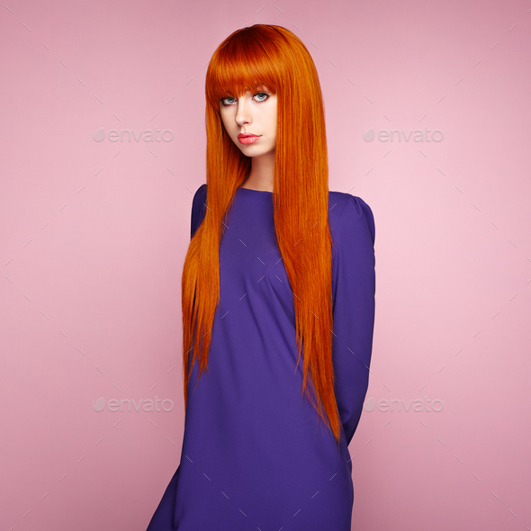 Portrait of beautiful woman with red hair. - Stock Photo - Images