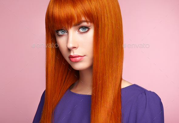 Portrait of beautiful woman with red hair. - Stock Photo - Images