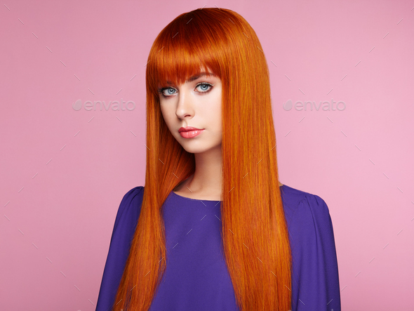 Portrait of beautiful woman with red hair. - Stock Photo - Images