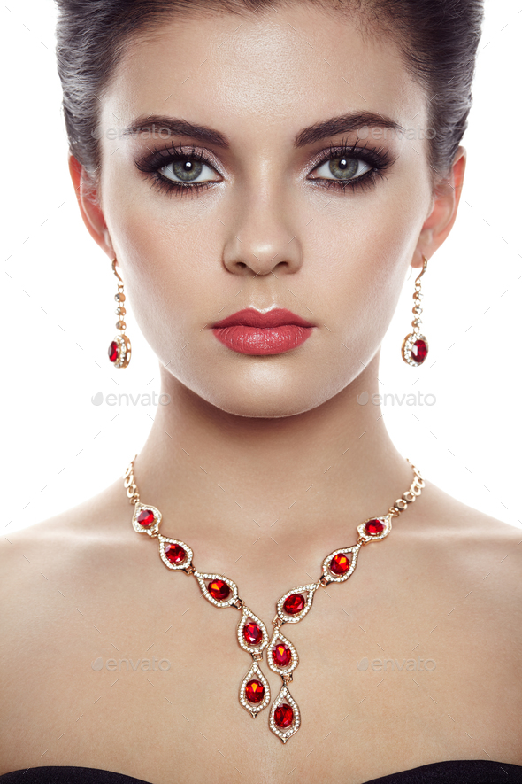 Fashion portrait of young beautiful woman with jewelry - Stock Photo - Images