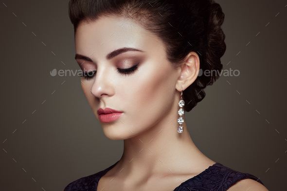 Fashion portrait of young beautiful woman with jewelry - Stock Photo - Images