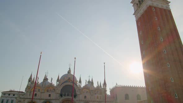 St Mark's Campanile and Basilica on Piazza San Marco Square in Venice Italy