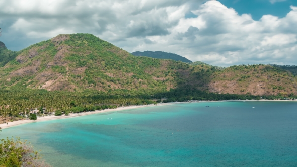 Tropical Lagoon with Clear Water and Beach with White Sand and Palm Trees in a Lombok Island alt