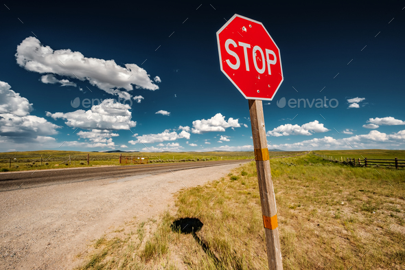 Stop sign on empty highway in Wyoming