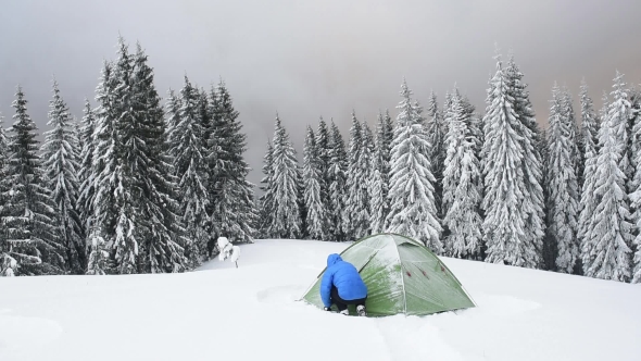 Green Tent in Winter Mountains