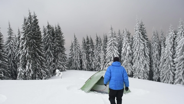 Green Tent in Winter Mountains