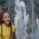 The Girl Splashes in the Fountain - VideoHive Item for Sale
