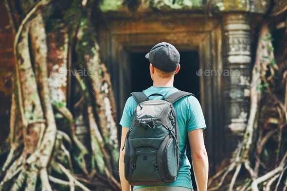 Traveler in the ancient temple - Stock Photo - Images
