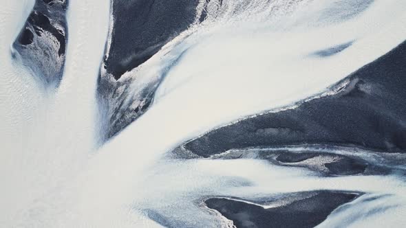 Aerial View of Patterns of Icelandic Rivers Flowing Into the Ocean Unusual Beautiful Landscape alt