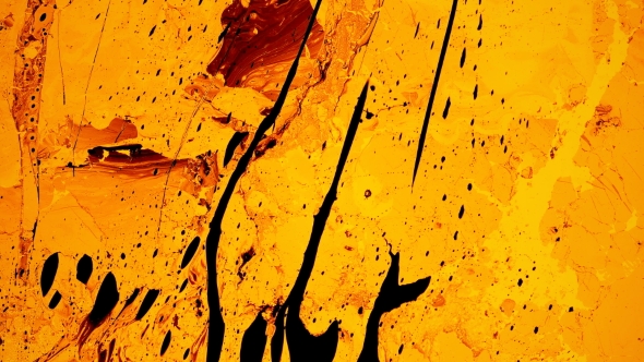 Ferromagnetic Fluid Creates Amazing Drawings in the Yellow Liquid,like Oil Substance alt