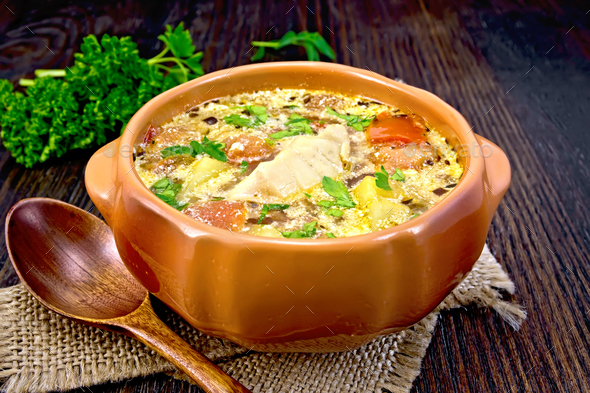 Soup fish with vegetables and cream on sackcloth - Stock Photo - Images