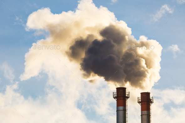 Stream of dark smoke from the chimney of factory Stock Photo by KonstantinKolosov