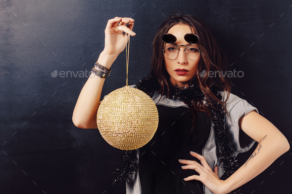 Portrait of seductive hipster girl wearing glasses - Stock Photo - Images