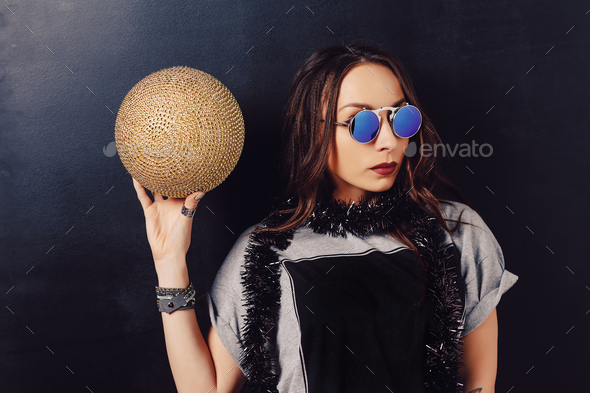 Portrait of seductive hipster girl wearing glasses - Stock Photo - Images