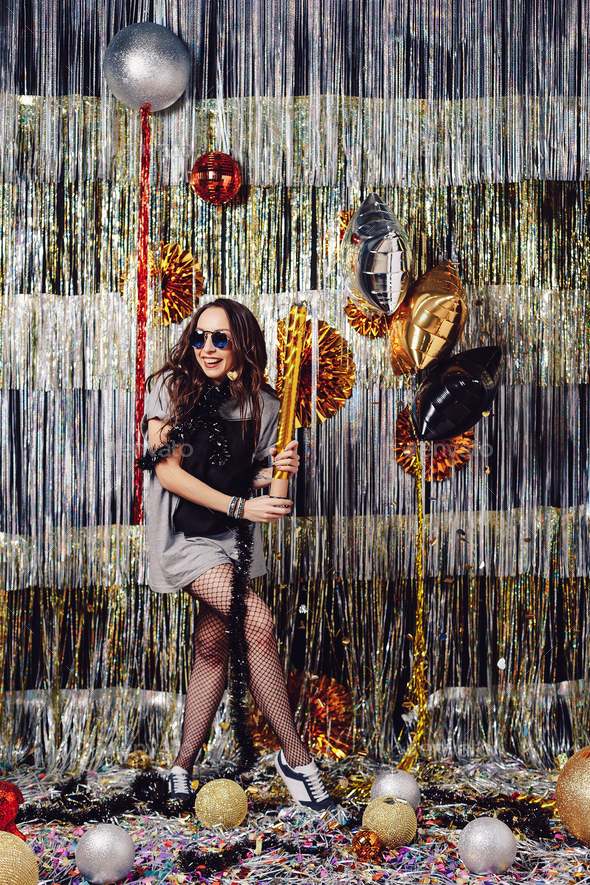 Portrait girl enjoying party and confetti - Stock Photo - Images