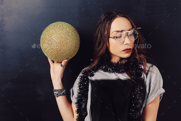 Portrait of seductive hipster girl wearing glasses - Stock Photo - Images