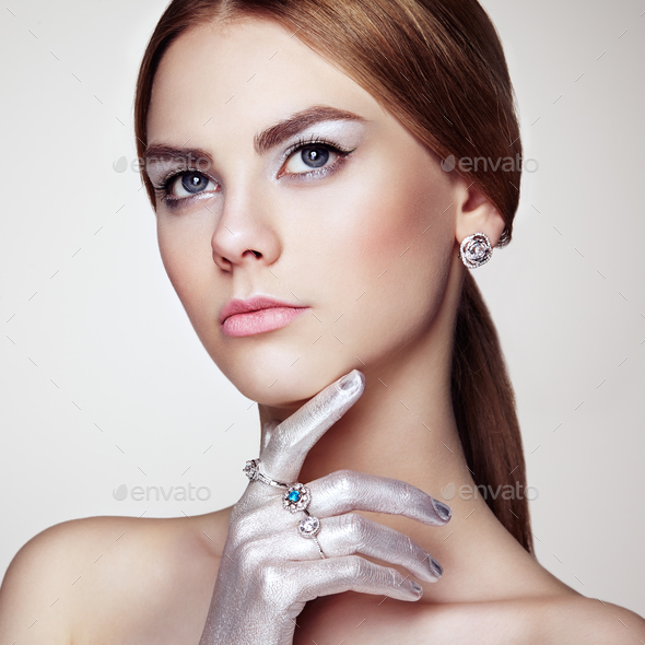 Fashion portrait of young beautiful woman with jewelry - Stock Photo - Images