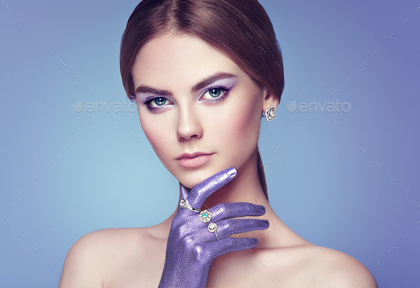 Fashion portrait of young beautiful woman with jewelry - Stock Photo - Images
