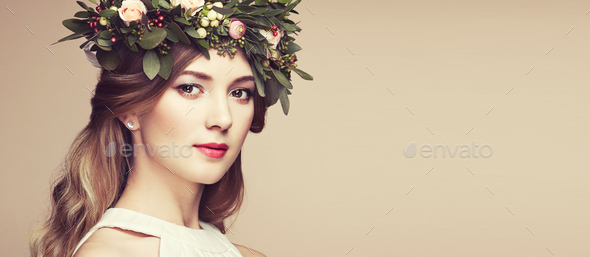 Beautiful blonde woman with flower wreath on her head - Stock Photo - Images