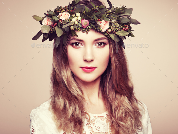 Beautiful blonde woman with flower wreath on her head - Stock Photo - Images