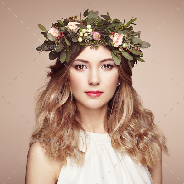 Beautiful blonde woman with flower wreath on her head - Stock Photo - Images