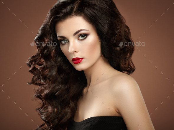 Brunette woman with curly hairstyle Stock Photo by heckmannoleg | PhotoDune