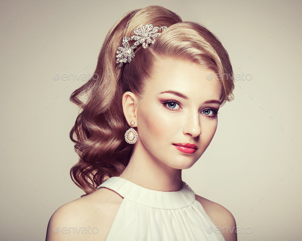 Fashion portrait of young beautiful woman with elegant hairstyle - Stock Photo - Images