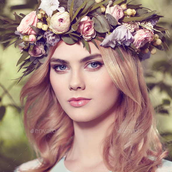 Beautiful blonde woman with flower wreath on her head - Stock Photo - Images