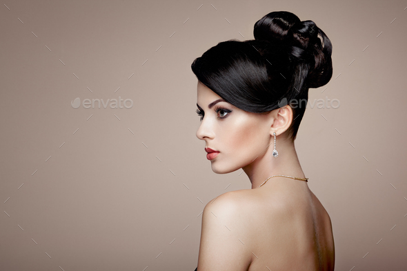 Fashion portrait of young beautiful woman with jewelry - Stock Photo - Images