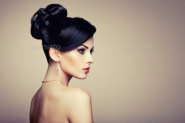 Fashion portrait of young beautiful woman with jewelry - Stock Photo - Images