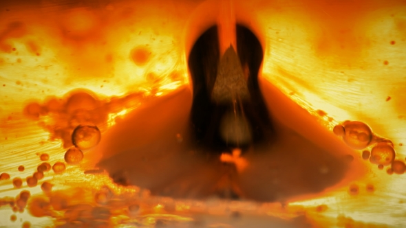 Hot Hot Oil Is a Red Yellow Color,like Boiling Lava,where Bubbles Rise Up alt