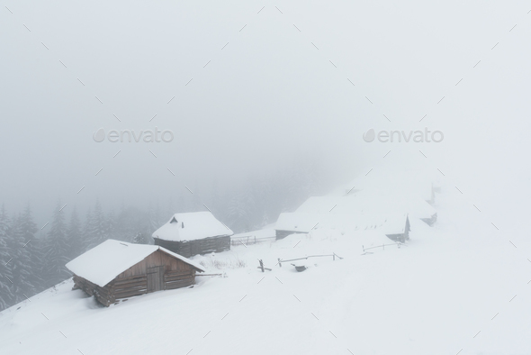 Fantastic landscape with snowy house - Stock Photo - Images