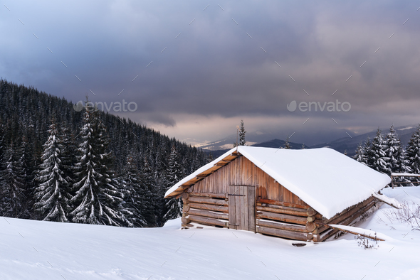 Fantastic landscape with snowy house - Stock Photo - Images