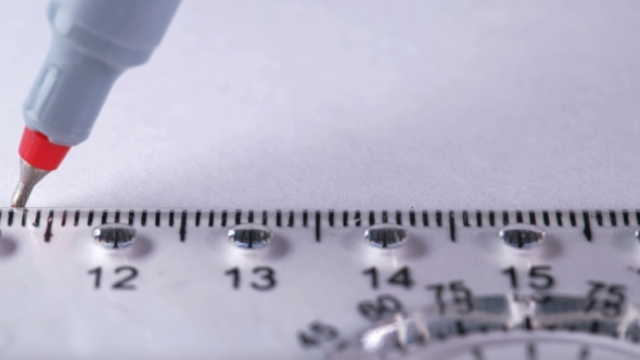 the Man Draws a Straight Line with a Ruler on a White Sheet alt