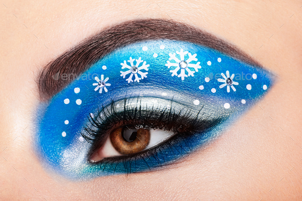 Eye girl makeover snowflakes - Stock Photo - Images