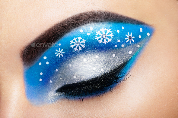 Eye girl makeover snowflakes - Stock Photo - Images