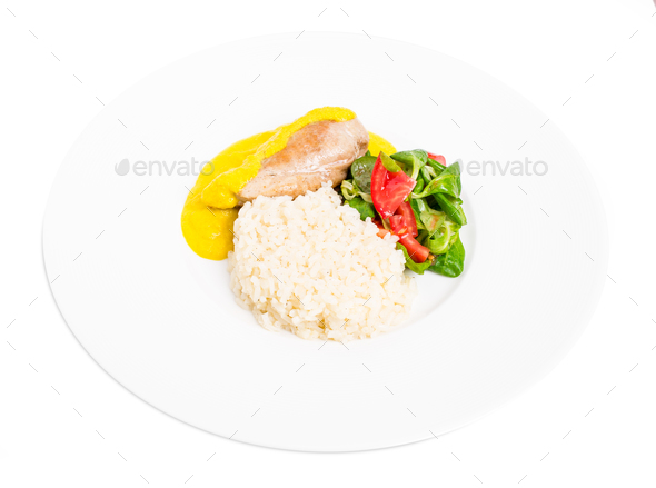 Roasted chicken fillet with saffron mousse. - Stock Photo - Images