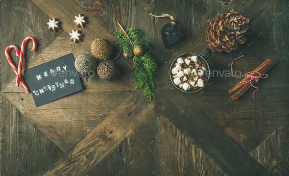 Flat-lay of greeting card, candy cane, hot chocolate, top view - Stock Photo - Images