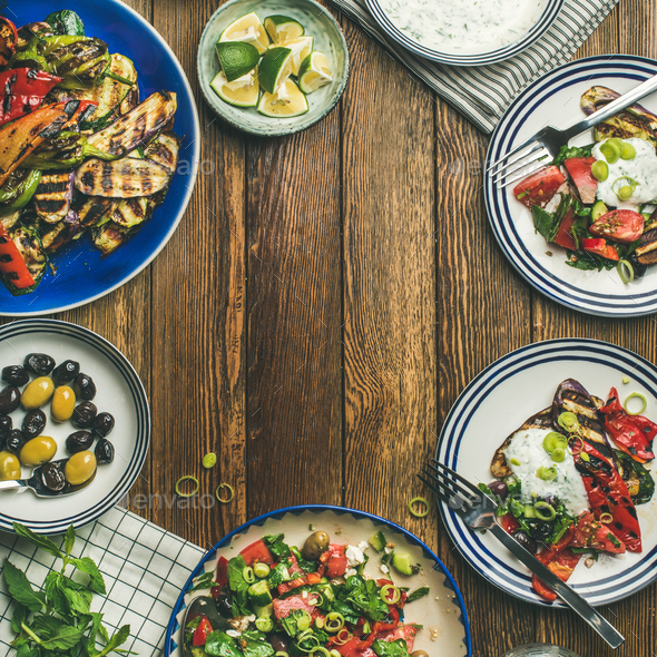 Flat-lay of healthy vegetarian dinner table setting, square crop - Stock Photo - Images
