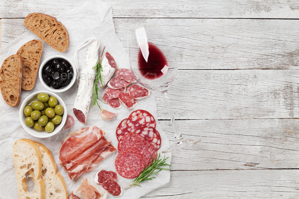 Salami, ham, sausage, prosciutto and wine - Stock Photo - Images