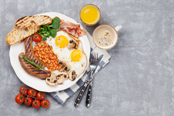 English breakfast. Fried eggs, sausages, bacon - Stock Photo - Images