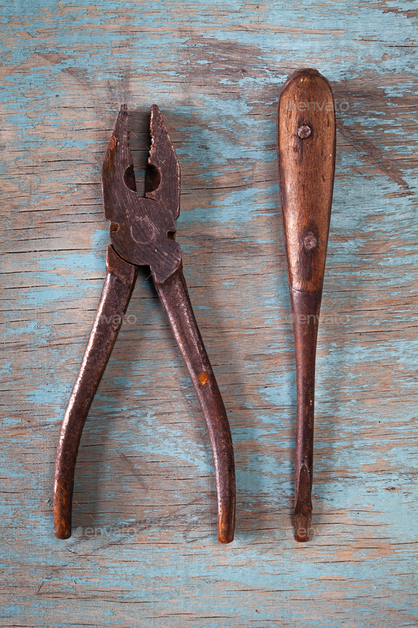 Vintage tools on a blue wooden background - Stock Photo - Images