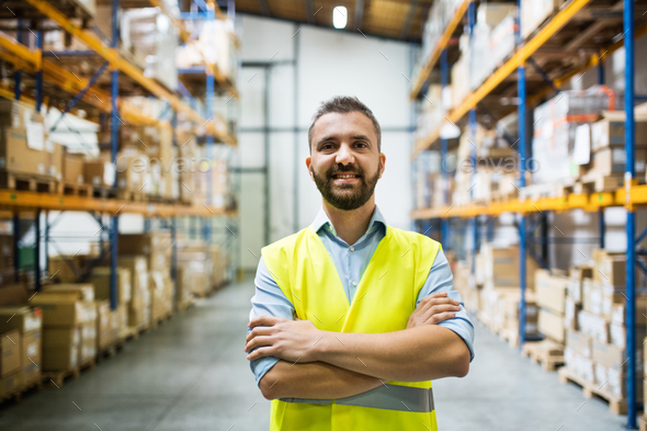 Portrait of a male warehouse worker. - Stock Photo - Images