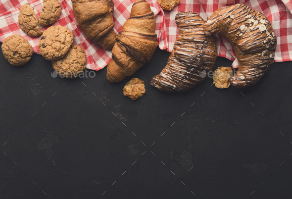 Homemade french croissants and cookies on wood - Stock Photo - Images