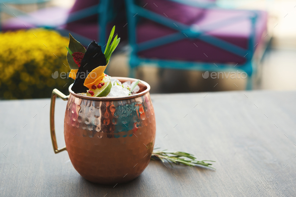 Moscow mule cocktail served on restaurant table - Stock Photo - Images