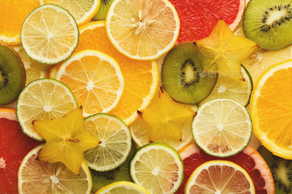 Exotic fruits slices background - Stock Photo - Images