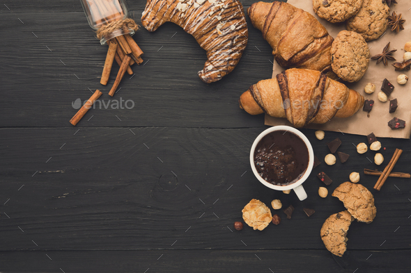 Freshly baked croissants and coffee background - Stock Photo - Images