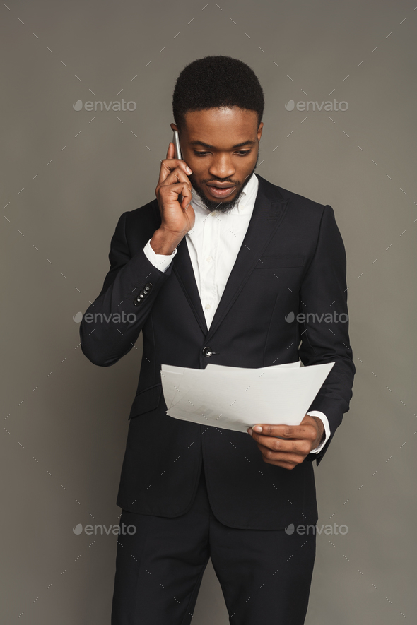 Handsome young black man portrait at studio background. - Stock Photo - Images