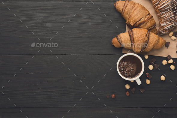 Freshly baked croissants and coffee background - Stock Photo - Images