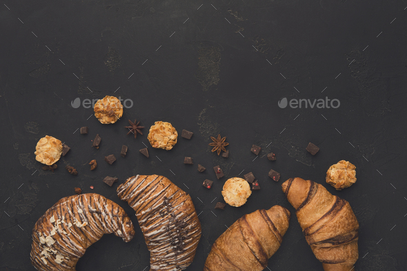 Homemade french croissants and cookies on wood - Stock Photo - Images